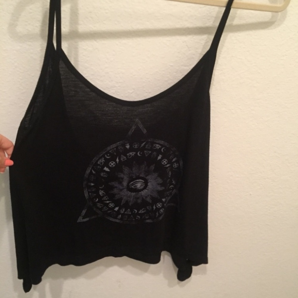 Black flowy tank top. Low back.